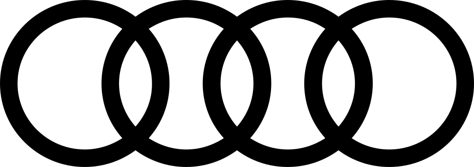 Audi's flat, minimalist logo — four interlocking monochrome rings.